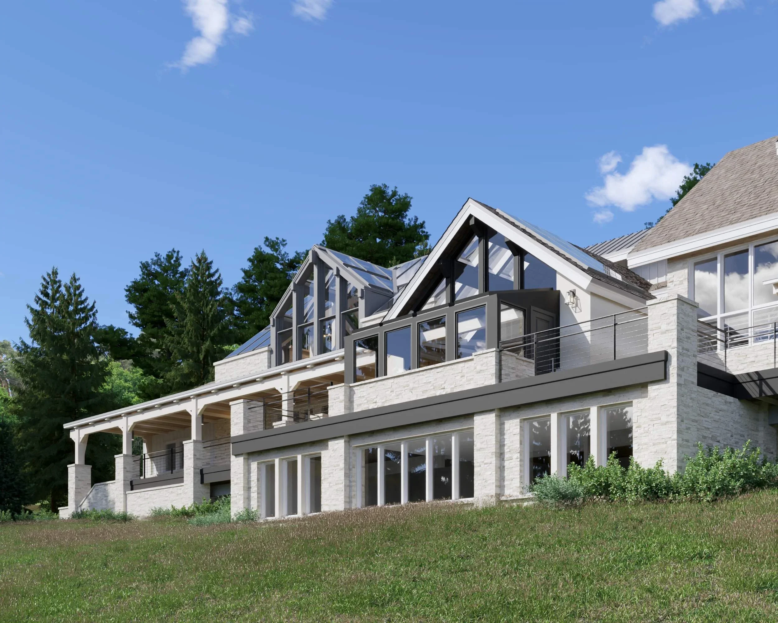 White brick home addition with black-framed gabled dormers, covered porch, and metal railings